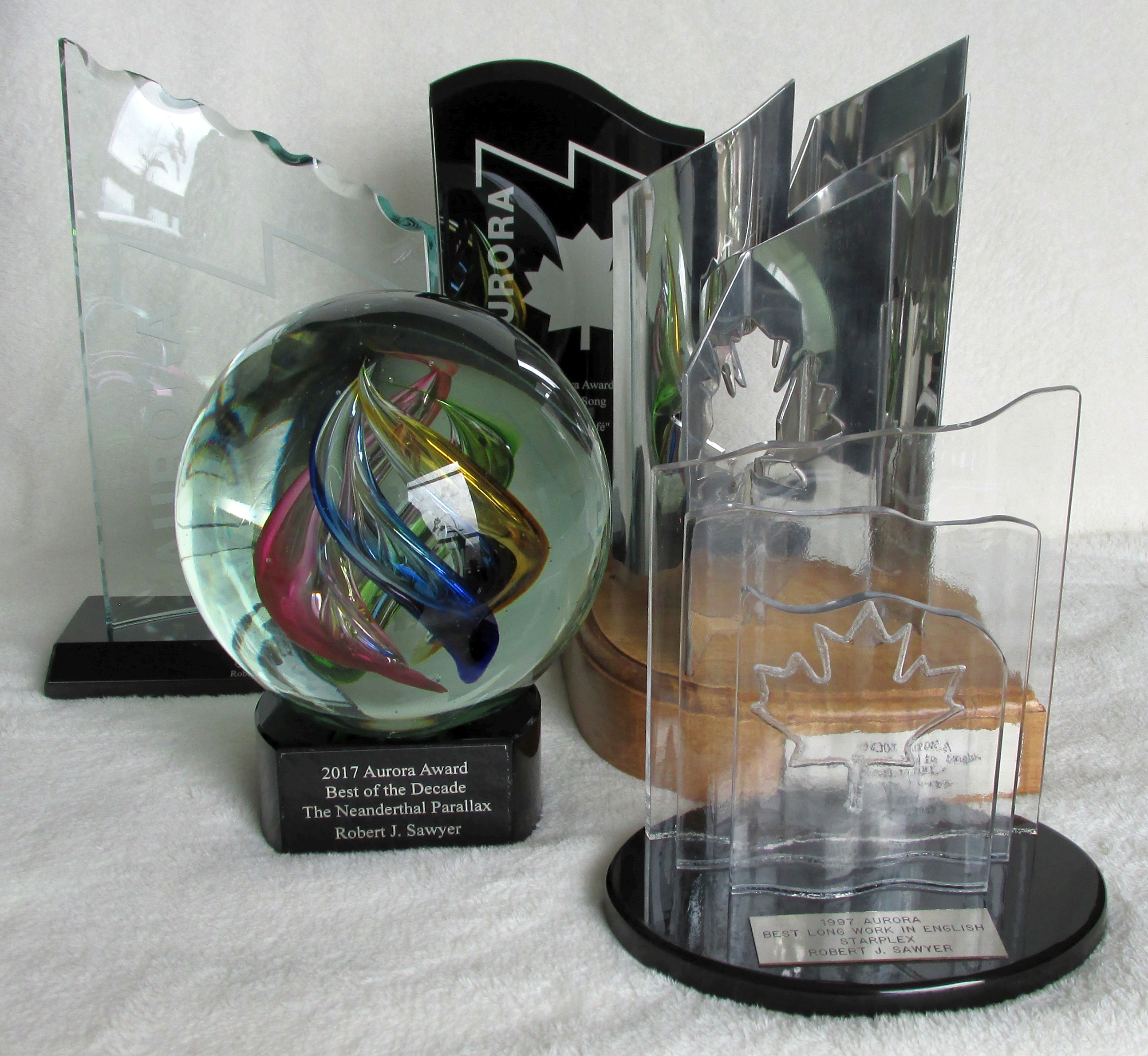 [5 of 15 Aurora Award trophies]